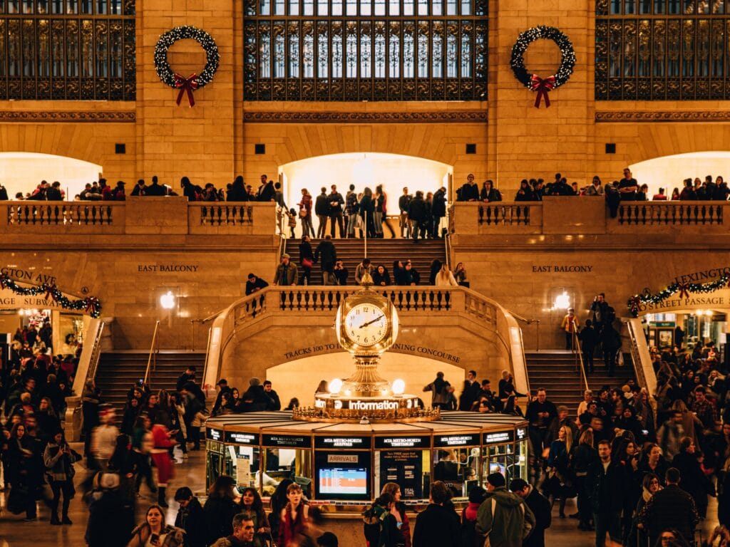 A crowd of people in a Grand central station.