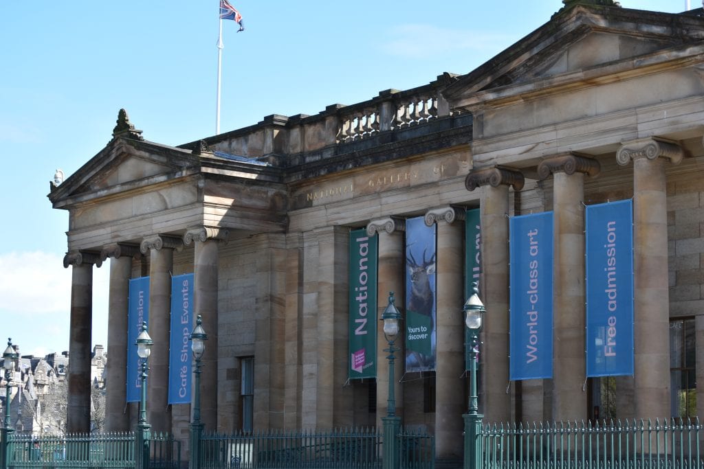 Neoclassical stone building with columns and banners reading "National," "World-class art," and "Free admission." One of the best attractions Edinburgh has to offer.