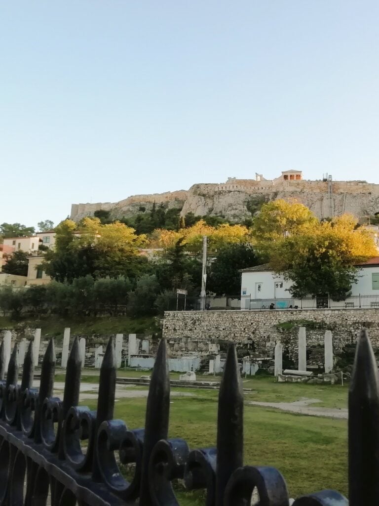 A view of the acropolis from a fence.