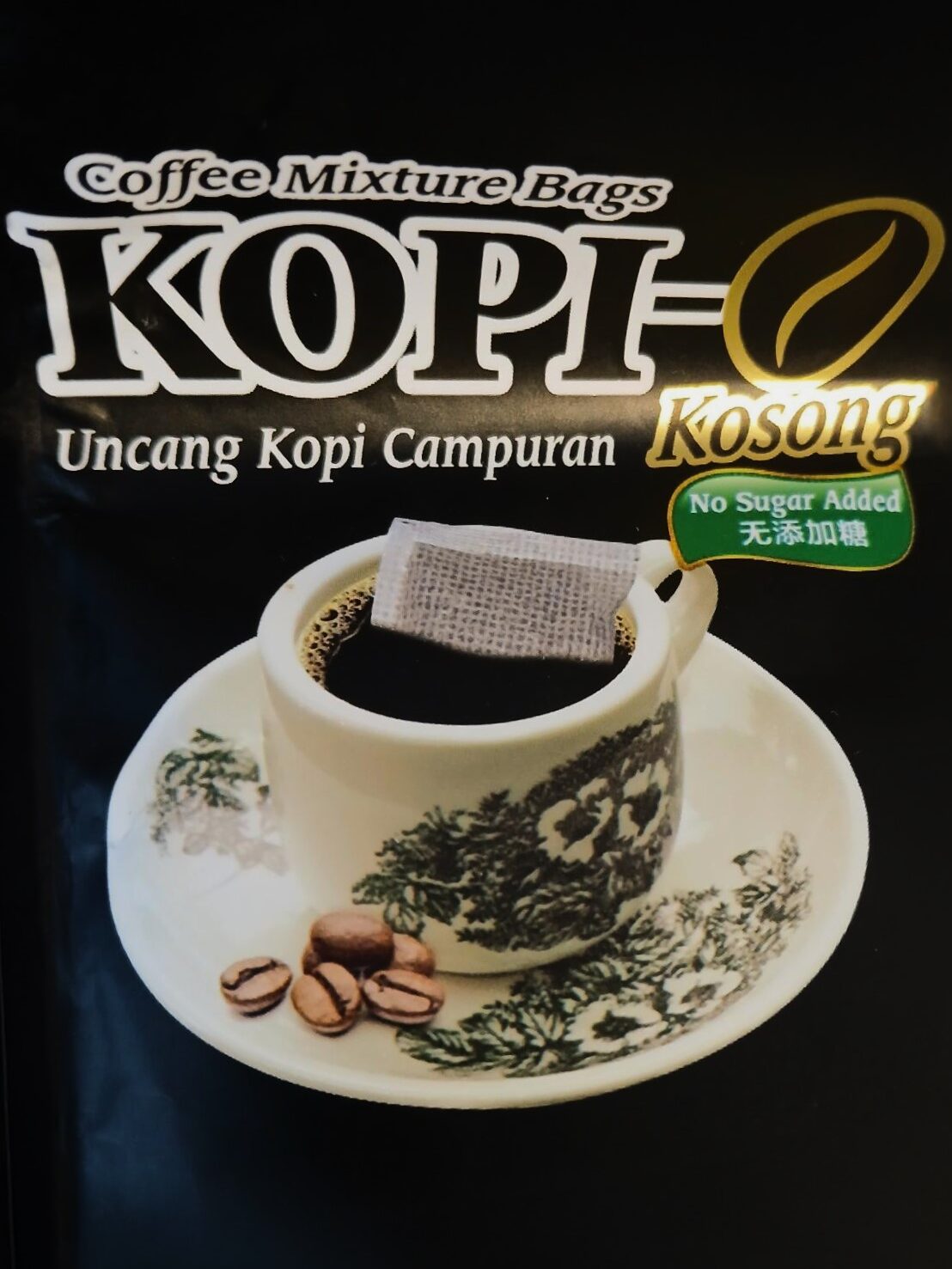 A packet of Kopi-O Kosong coffee sits against a dark background, showcasing a cup with a tantalizing coffee mixture bag alongside beans, reminiscent of the famous kopi culture in Singapore.